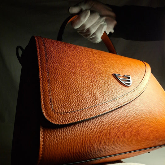 Full Grain Leather vs Genuine Leather vs PU Leather : Which Handbag Material Lasts the Longest?
